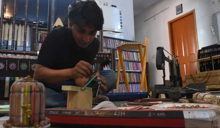Sharpen up: Pakistani artist aims for Guinness record with largest swing made from pencils
