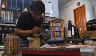 Sharpen up: Pakistani artist aims for Guinness record with largest swing made from pencils