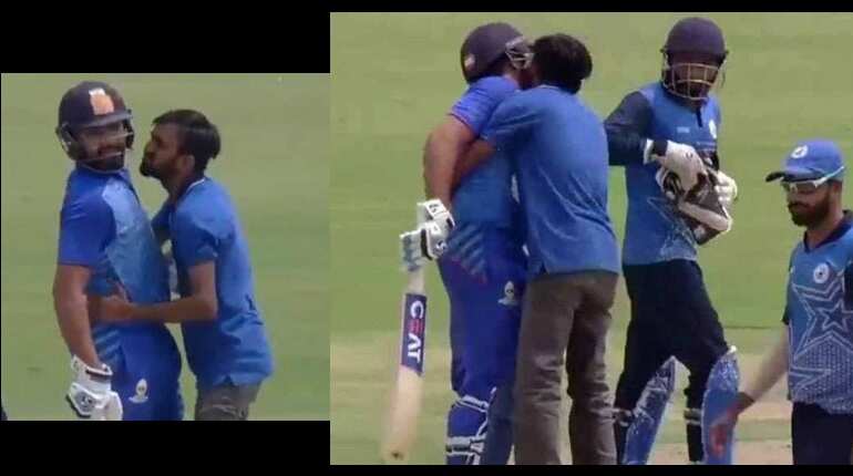 Watch: Fan invades pitch & kisses Rohit Sharma, wife's reaction is epic