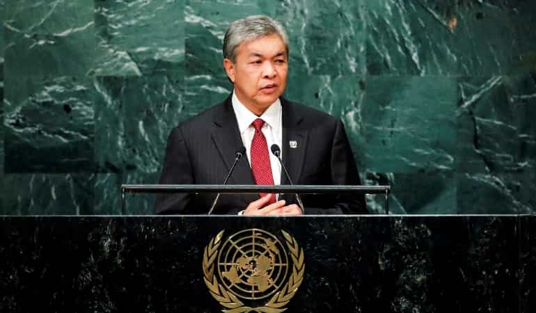Malaysian ex-deputy PM charged with money laundering, graft Malaysian ex-deputy PM charged with money laundering, graft