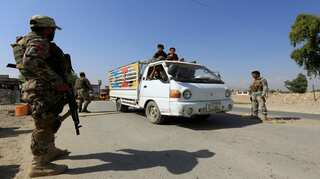 Afghans brave militant threat to vote in delayed election