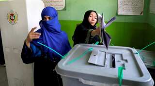 Afghan polling centres plagued by problems as casualties surge