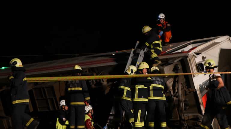 At least 18 dead after train flips over in Taiwan