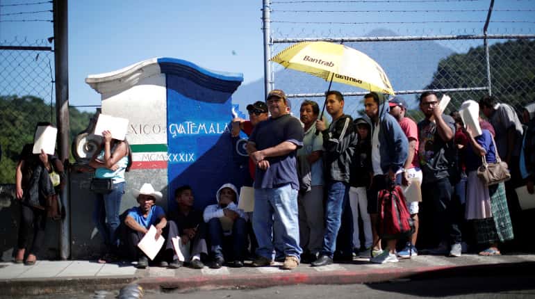 US judge temporarily blocks Trump's asylum restrictions