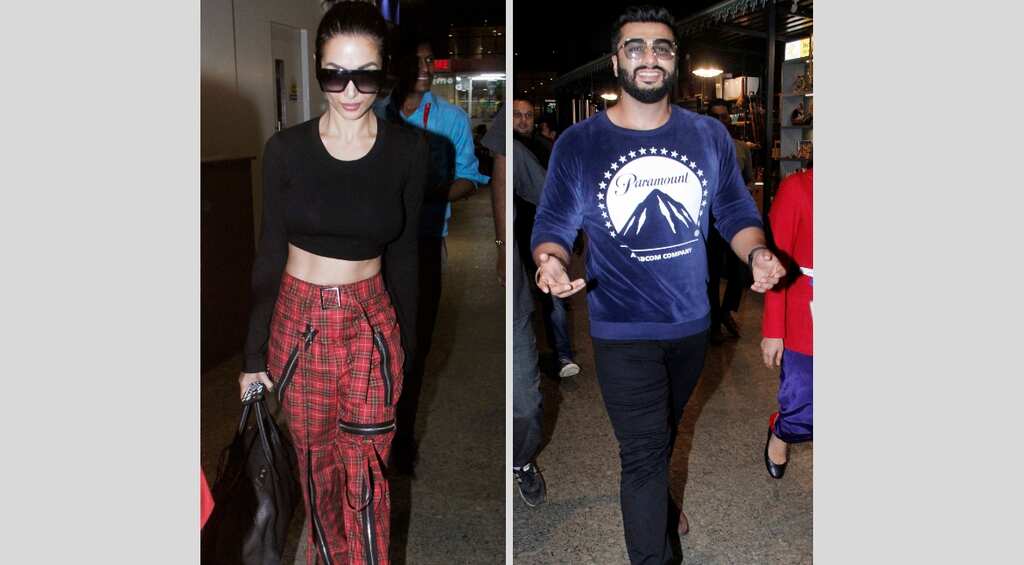 In photos: Arjun Kapoor, Malaika Arora return to Mumbai after celebrating her birthday in Italy