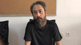 Freed Japanese journalist says Syria kidnap ordeal was 'hell'