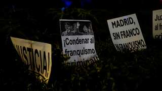 Thousands protest outside Madrid cathedral against Franco burial