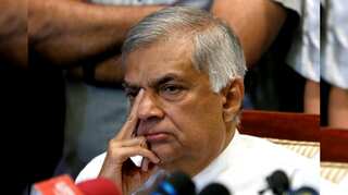 Sacked Sri Lanka PM Wickremesinghe stays put, political crisis worsens