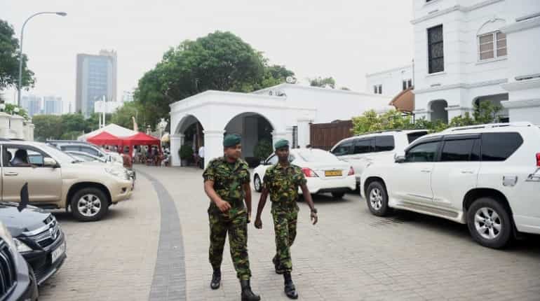 Sri Lanka reinstates top detective after outcry