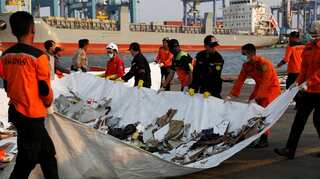 Part of landing gear, one 'black box' recovered from Indonesia jet