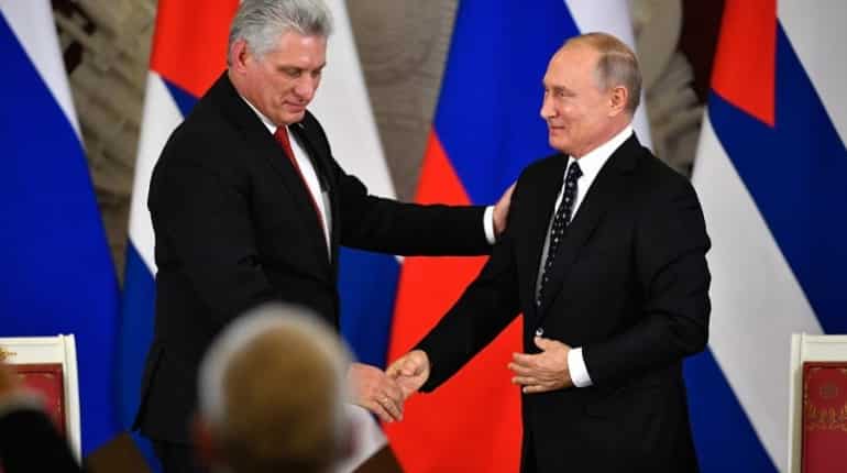 Putin meets new Cuban leader on first Moscow visit Putin meets new Cuban leader on first Moscow visit