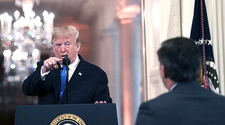 White House revokes CNN reporter's press pass after furious exchange with Trump White House revokes CNN reporter's press pass after furious exchange with Trump