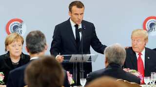 With Trump sitting nearby, Macron calls nationalism a betrayal; adds 'old demons are reawakening'
