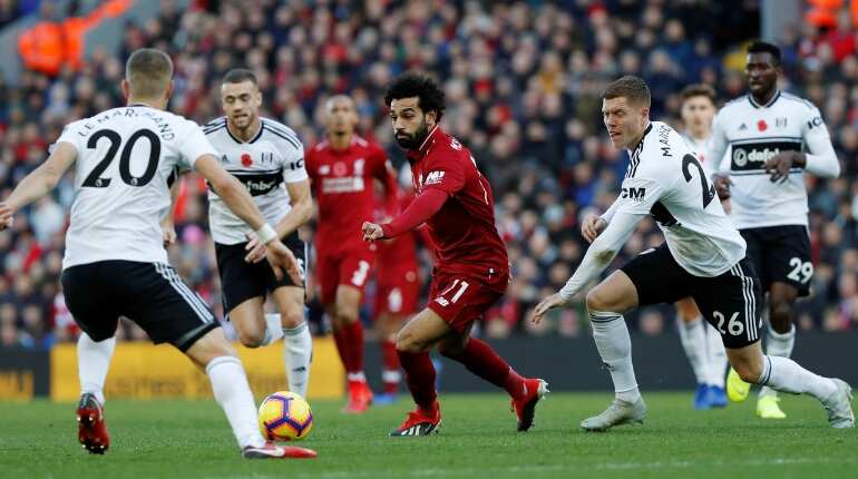 Liverpool defeat fading Fulham to continue title push Liverpool defeat fading Fulham to continue title push