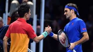 Roger Federer beaten by Kei Nishikori in ATP Finals opener