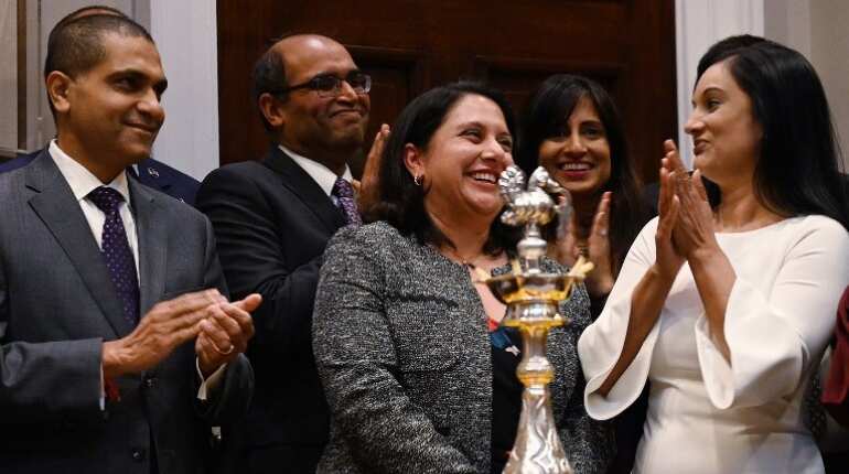 Trump administration regulatory czar Neomi Rao (C)