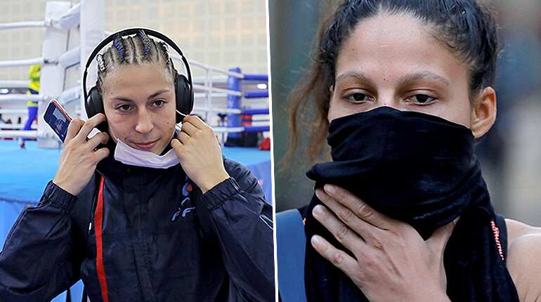 Women boxers wear masks, scarves to beat smog at world championship in India