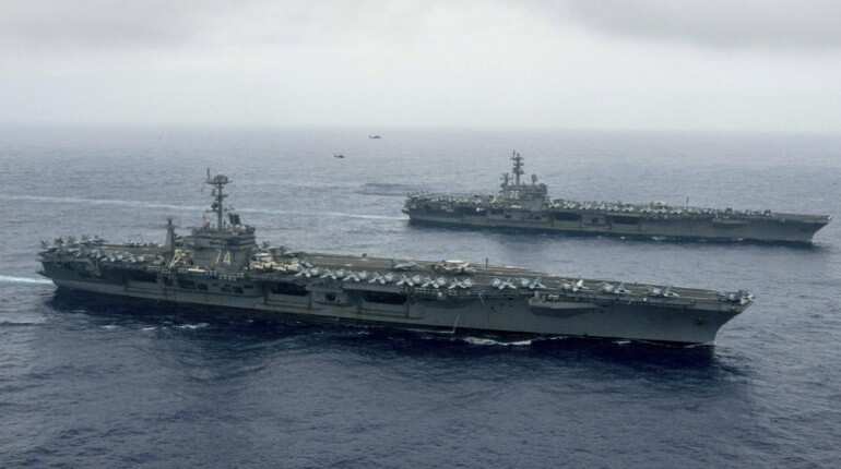 US aircraft carriers conduct war drills in Philippine Sea close to North Korea US aircraft carriers conduct war drills in Philippine Sea close to North Korea