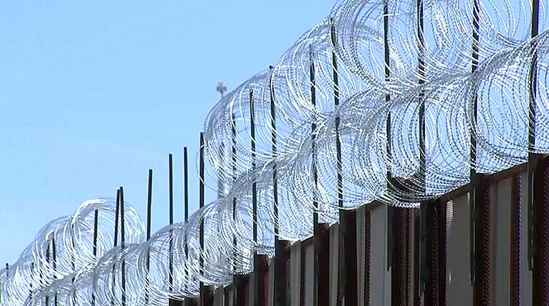 US military lays barbed wire at border as migrant caravan approaches