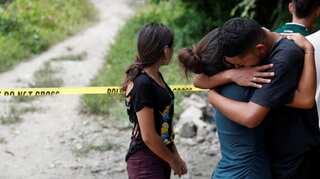 Terror of gang violence drives migrant caravans northward