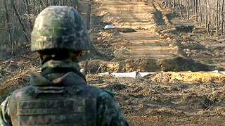 Two Koreas connect DMZ road across border: Seoul