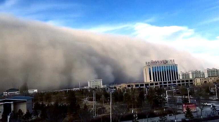 Watch: Northwest China hit by sandstorm sparks rural fires, slows down traffic
