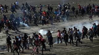 Mexico deports scores of Central American migrants who stormed US border
