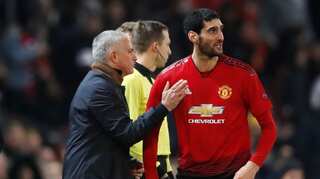Manchester United qualify after controversial late Fellaini winner