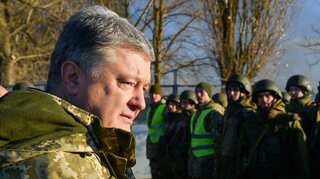 Tens of police hospitalised after Ukraine clashes ahead of poll