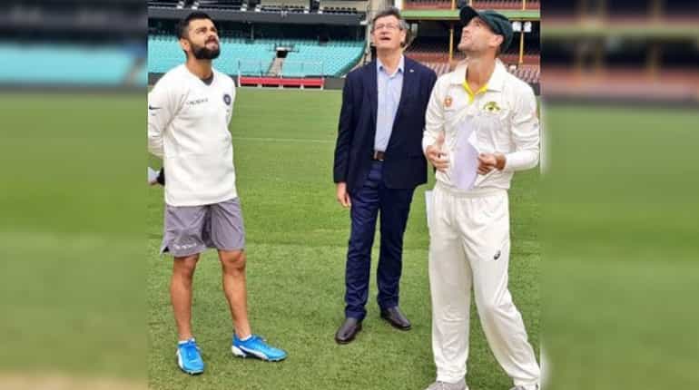 Twitterati troll Virat Kohli for wearing shorts during toss against Australia in warm-up match Twitterati troll Virat Kohli for wearing shorts during toss against Australia in warm-up match