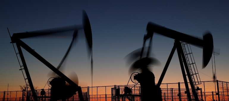 Oil falls to $53 on economic worries, surging supply