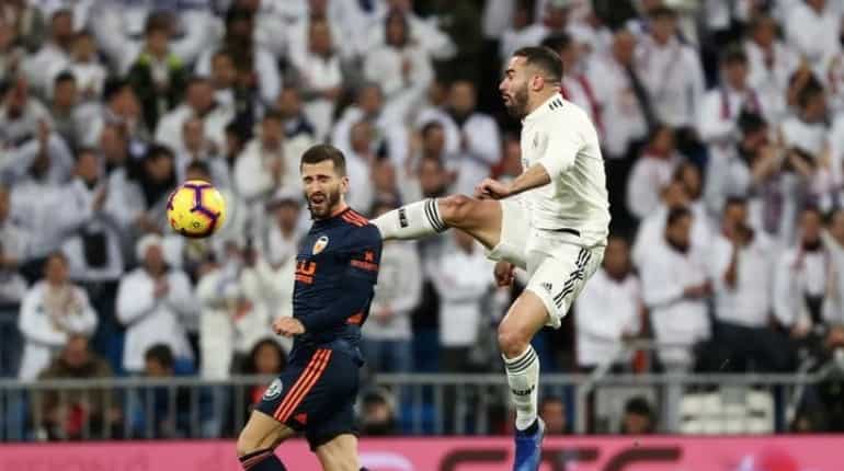 Real Madrid fumble their way to victory over Valencia Real Madrid fumble their way to victory over Valencia