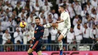 Real Madrid fumble their way to victory over Valencia