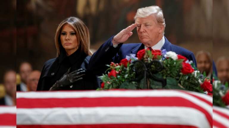 Trump pays respects as president Bush lies in state in US Capitol