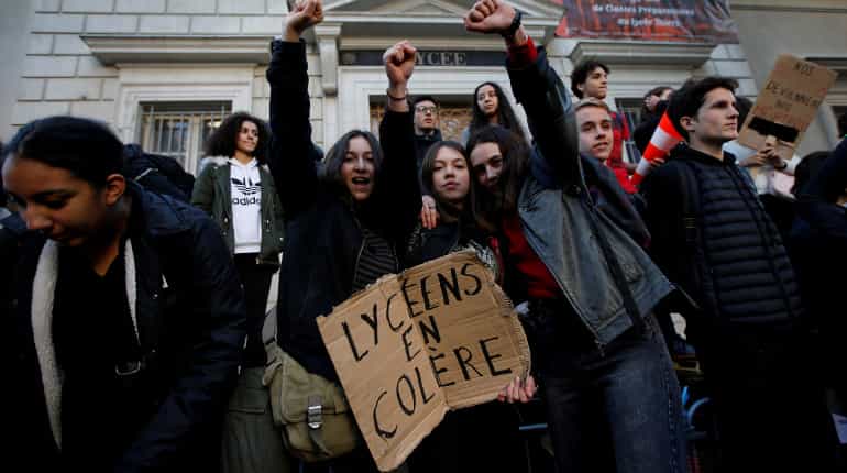 Macron makes U-turn on fuel-tax increases in face of 'yellow vest' protests