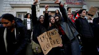 Macron makes U-turn on fuel-tax increases in face of 'yellow vest' protests