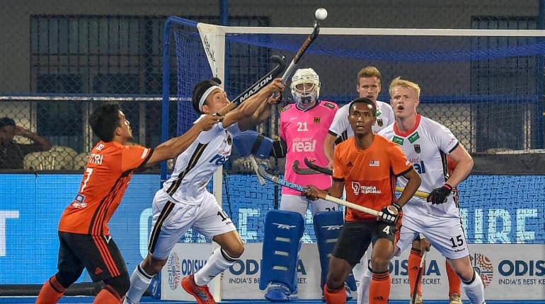Hockey World Cup: Germany beat Malaysia 5-3 to book quarterfinal berth Hockey World Cup: Germany beat Malaysia 5-3 to book quarterfinal berth