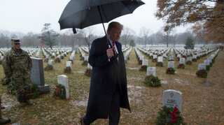 Trump, criticised for skipping earlier visits, travels to cemetery