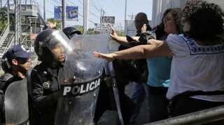 Nicaragua police raid opposition paper, end rights groups' permits