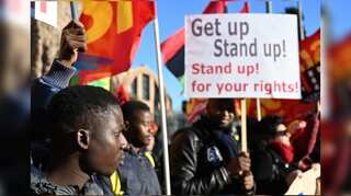 Protesters march against Italy's tough new anti-migrant law