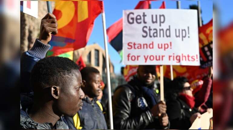 Protesters march against Italy's tough new anti-migrant law