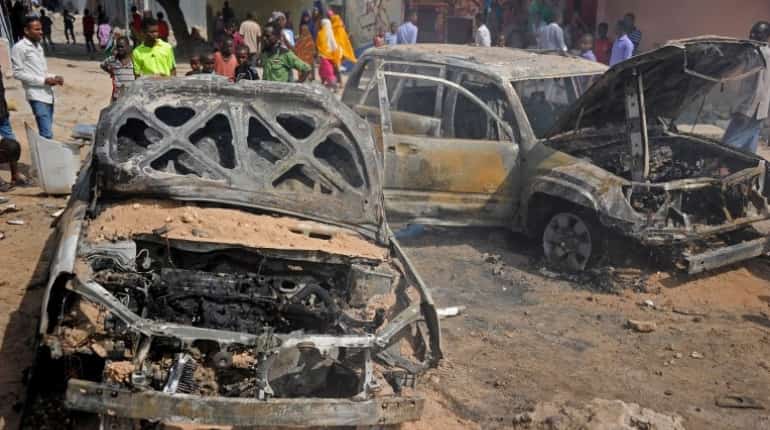 Death toll rises to 20 in Somalia's car-bomb attack Death toll rises to 20 in Somalia's car-bomb attack