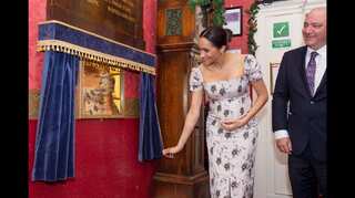 'Very pregnant' UK duchess Meghan makes Christmas trip to care home