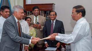 Sri Lanka political crisis ends as President Sirisena names new cabinet