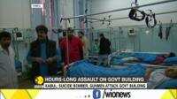 Gunmen killed 28 and injured more than 20 others in raid on Afghan government building