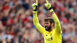 No extra pressure for title-chasing Liverpool, says Alisson