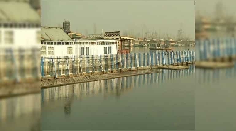 Dal Lake freezes partially as mercury dips in Kashmir Dal Lake freezes partially as mercury dips in Kashmir