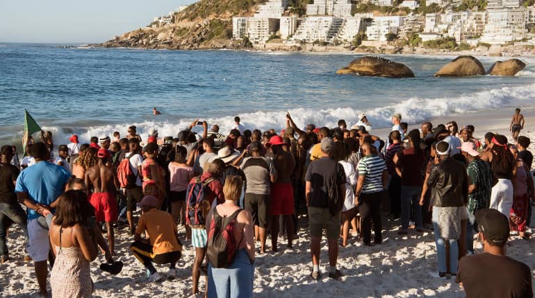 Race row breaks out in Cape Town after guards clear 'black visitors' from beach Race row breaks out in Cape Town after guards clear 'black visitors' from beach