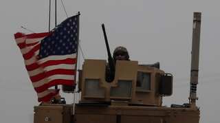 US flag flies in Syria's Manbij despite pullout notice