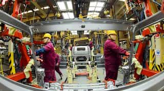 China's manufacturing contracts for 5th month, sparks calls for increased stimulus